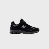 New Balance U2002DX - Black / Magnet