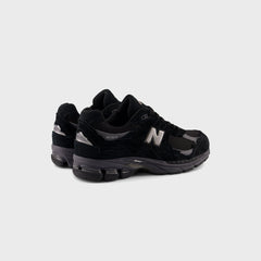 New Balance U2002DX - Black / Magnet